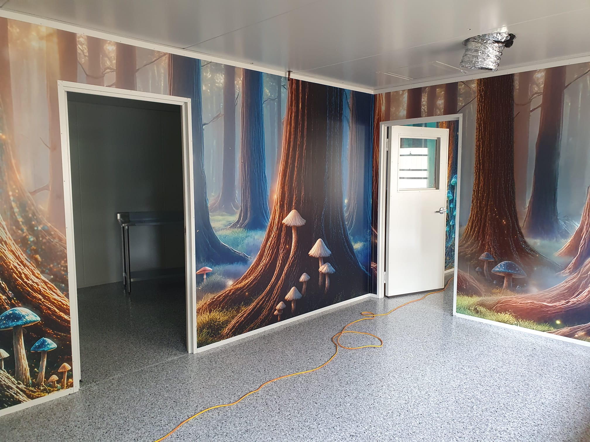 Large format printed graphics at a CAT facility