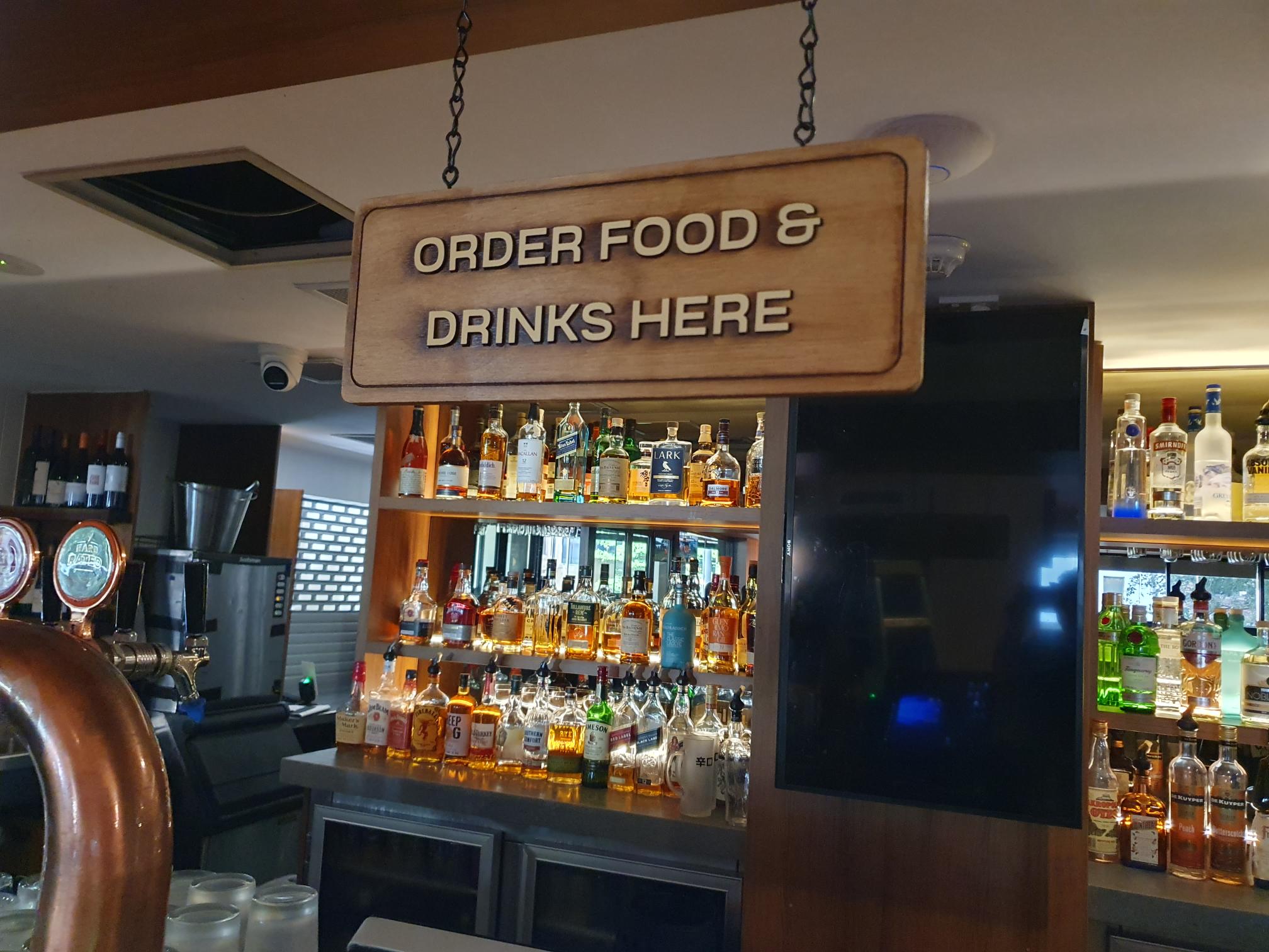 Pub food and drinks directional sign
